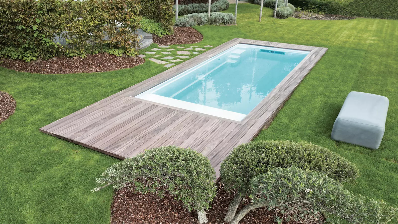 The Encore™ with Cover, a fiberglass pool design manufactured by Leisure Pools