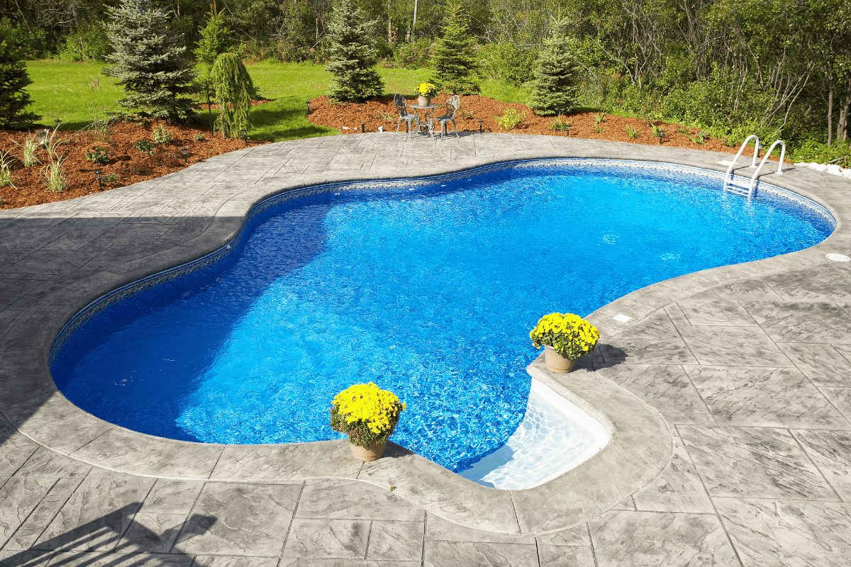 Homeowner's backyard image showcasing a Fiberglass Pool Installation Process in Colorado