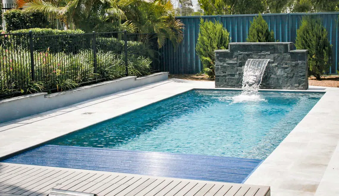 Leisure Pools Front Range creates a relaxing, easy-care backyard space great for families to enjoy and unwind together.